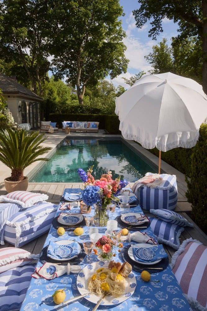 Gestreiftes kissen aus bio-baumwolle mit fransenbesatz 50x30 blau - 0